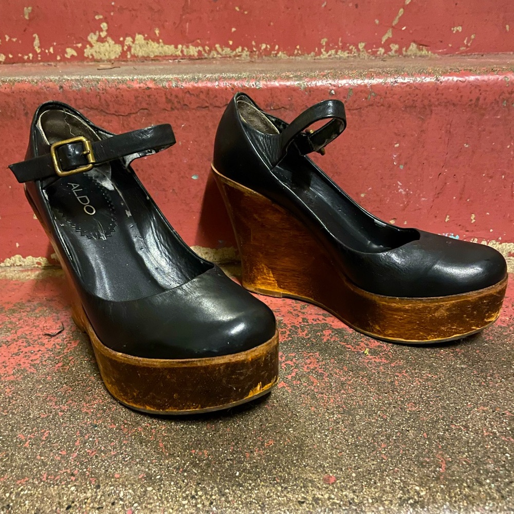 Aldo Black Mary Jane wedge with wooden platform. Size 8.5